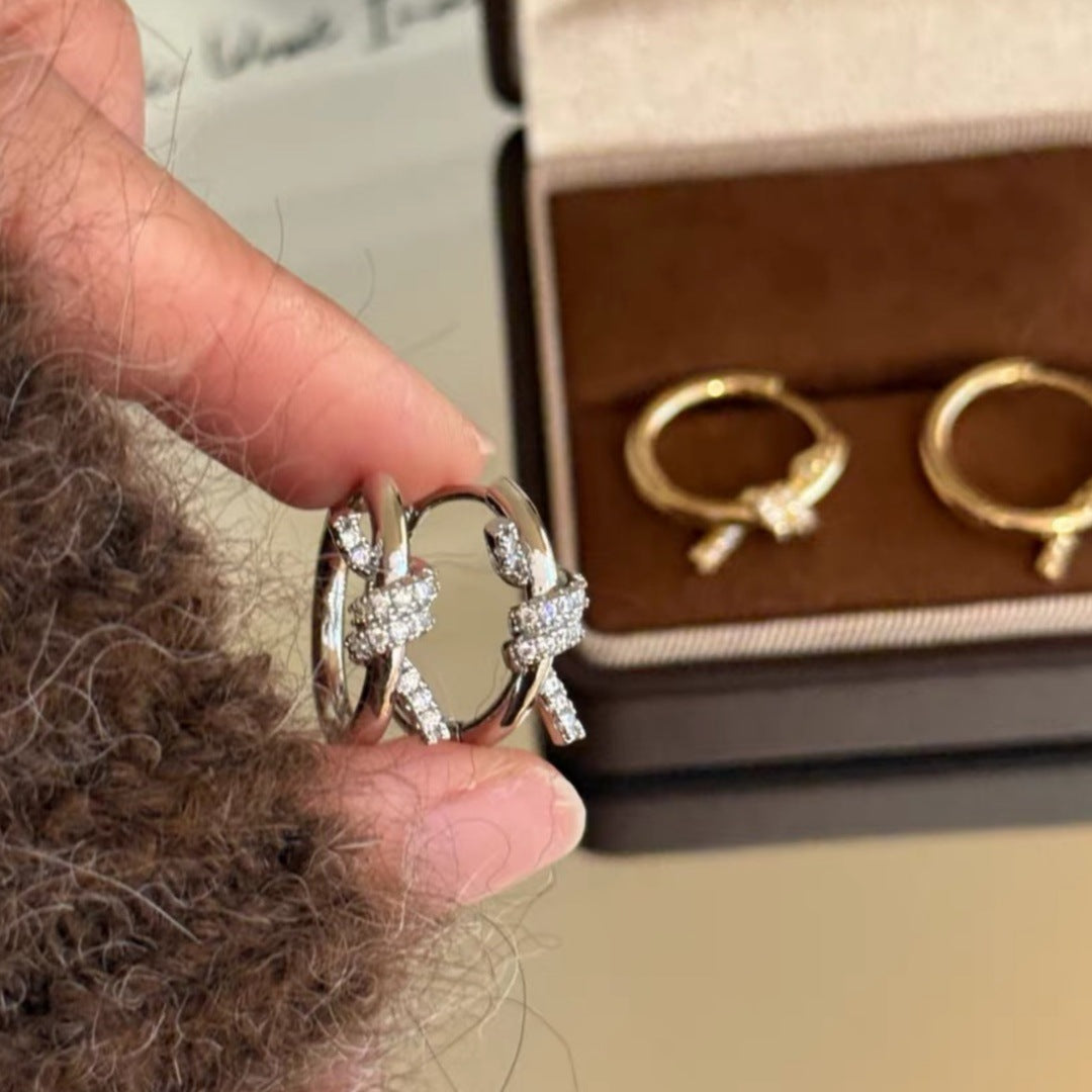 Knot twisting and wrapping hoop earrings