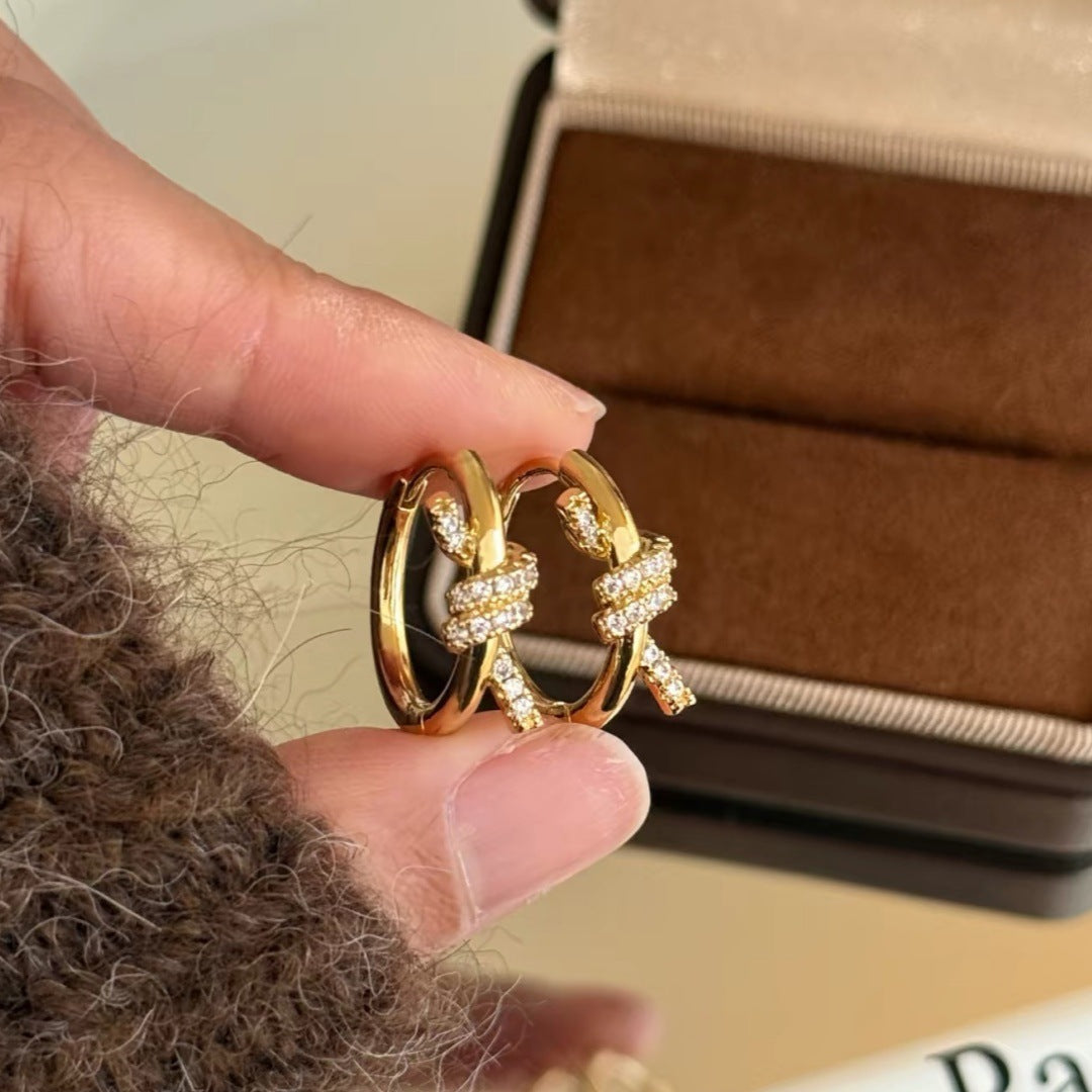 Knot twisting and wrapping hoop earrings